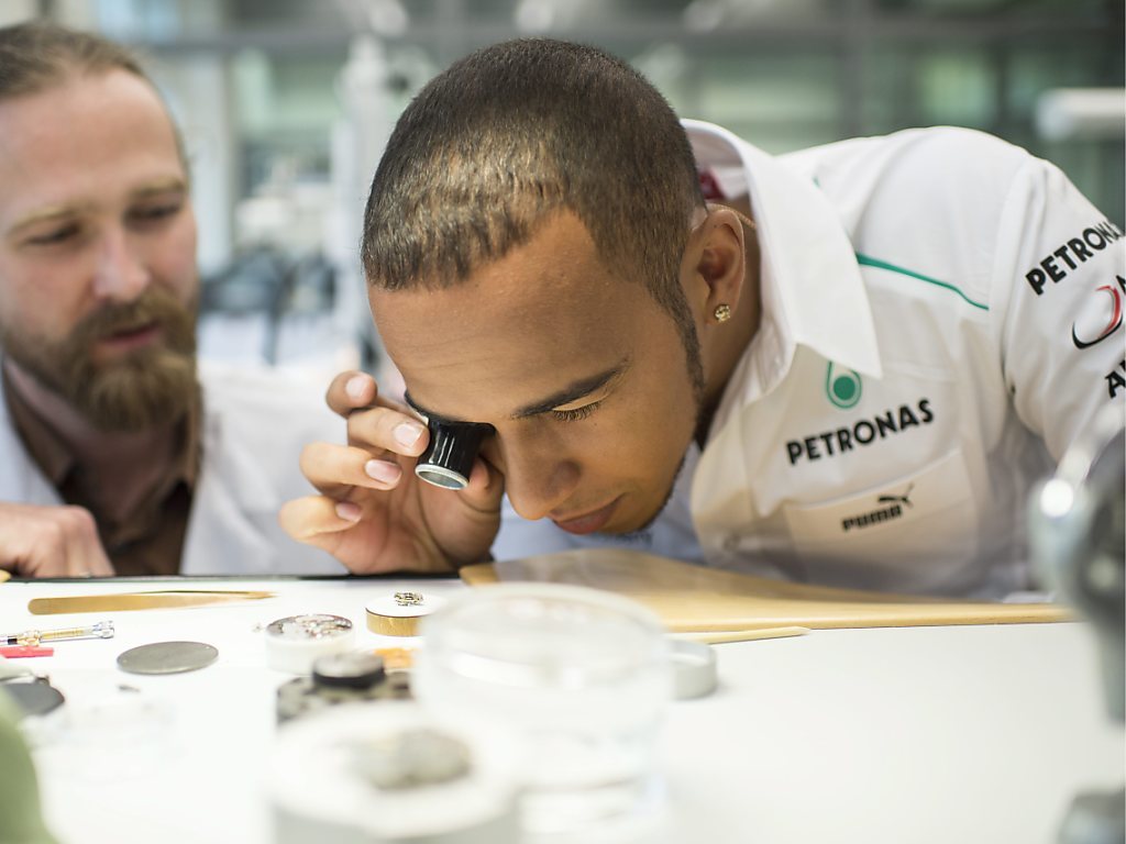 Opposé à Swatch sur l'utilisation de son patronyme par une marque plus que centenaire, Lewis Hamilton prête son image à la marque IWC du concurrent Richemont. (archive)