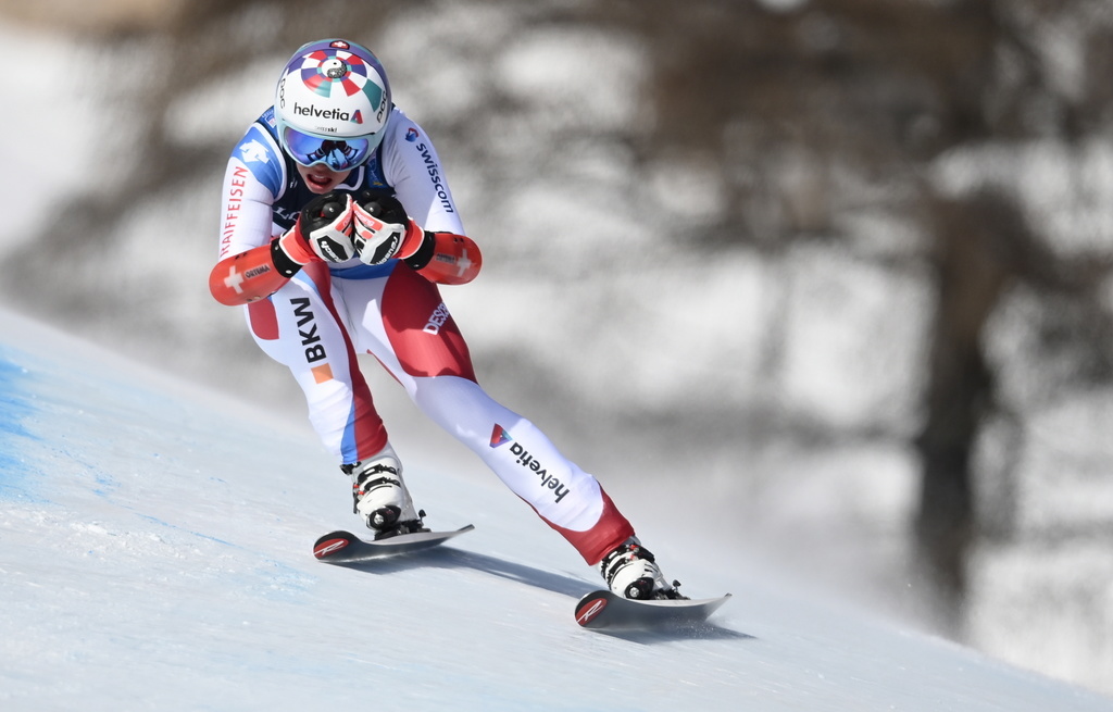 epa09013760 Michelle Gisin of Switzerland speeds down the slope during the Super G portion of the Women's Alpine Combined competition at the FIS Alpine Skiing World Championships in Cortina d'Ampezzo, Italy, 15 February 2021. EPA/CHRISTIAN BRUNA