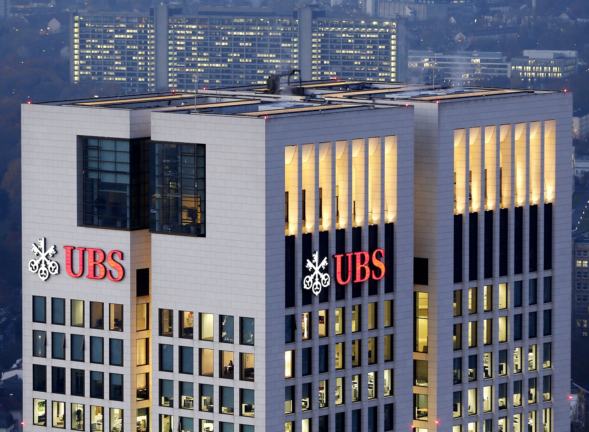 FILE - In this Tuesday, Nov. 13, 2012, file photo, the German headquarter of Swiss UBS bank is photographed in Frankfurt, Germany. UBS AG reports quarterly results before the market open on Tuesday, Oct. 29, 2013. (AP Photo/Michael Probst, File)