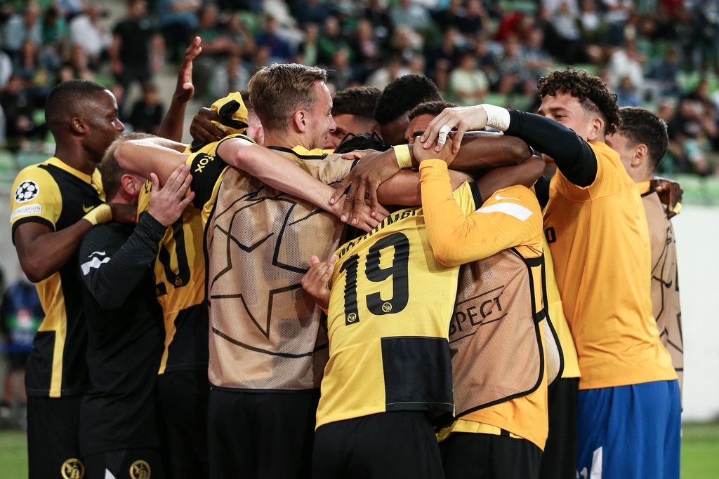 Young Boys' player celebrate their third goal during the UEFA Champions League Play-off second leg soccer match between Ferencvaros TC and BSC Young Boys of Switzerland, on Tuesday, August 24, 2021 at the Groupama Arena stadium in Budapest, Hungary. (KEYSTONE/Thomas Hodel)