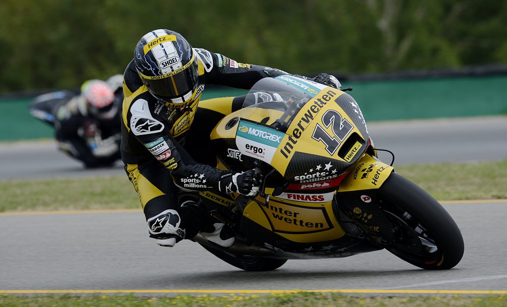 epa03835601 Swiss Moto2 rider Thomas Luethi of the Interwetten Paddock Moto2 Racing team in action during the qualification at the Motorcycling Grand Prix of the Czech Republic at Masaryk circuit in Brno, Czech Republic, 24 August 2013. The Czech MotoGP race will take place on 25 August.  EPA/FILIP SINGER