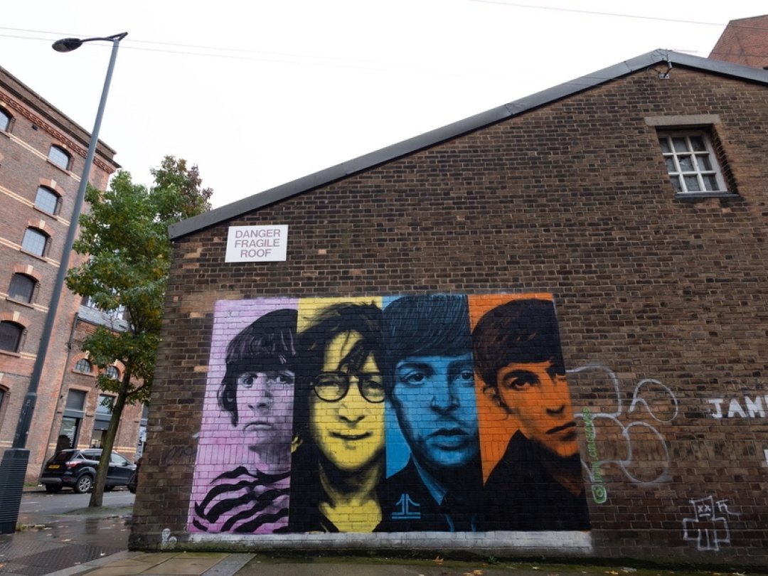 Les Beatles, ici une fresque murale les représentant à Liverpool prise ce 2 novembre 2023, ont sorti une nouvelle chanson.