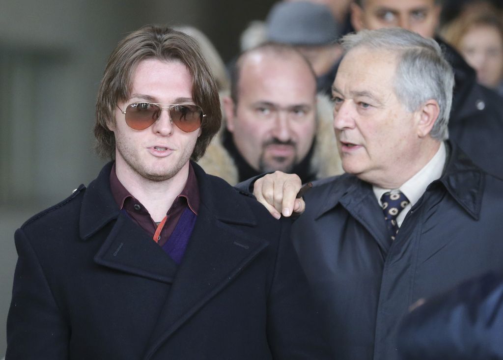 Raffaele Sollecito, left, and his father Francesco leave after attending the final hearing before the third court verdict for the murder of British student Meredith Kercher, in Florence, Italy, Thursday, Jan. 30, 2014. The first two trials produced flip-flop verdicts of guilty then innocent for Kercher former roommate, American student Amanda Knox, who is not attending the hearing,  and her former Italian boyfriend, Raffaele Sollecito, and the case has produced harshly clashing versions of events. A Florence appeals panel designated by Italy's supreme court to address issues it raised about the acquittal is set to deliberate Thursday, with a verdict expected later in the day. (AP Photo/Antonio Calanni)