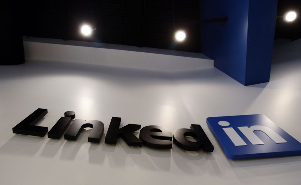 FILE - In this May 19, 2011 file photo,the LinkedIn logo is displayed in the foyer at headquarters in Mountain View, Calif. LinkedIn Corp. reports quarterly earnings on Thursday, Feb. 6, 2014. (AP Photo/Paul Sakuma, File)