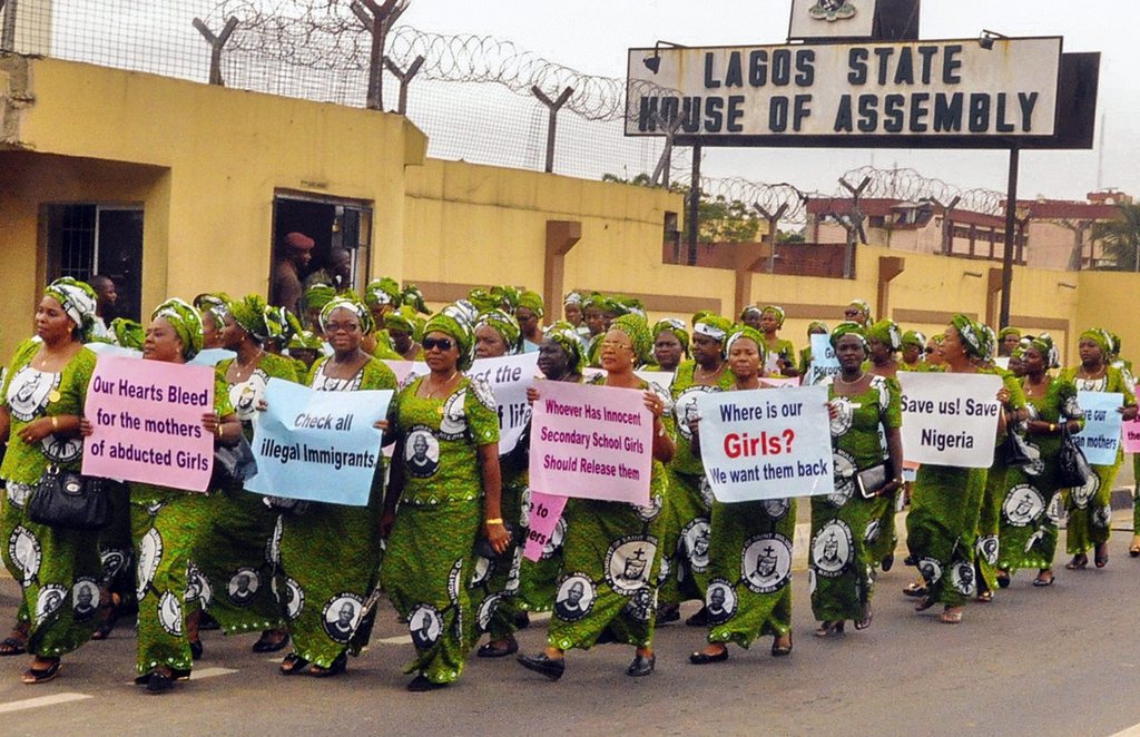 epa04201273 Nigerian members of the Ladies of Lumumba Metropilitan Council of Catholic Church group protest over the government's failure to rescue the abducted Chibok school girls in Lagos, Nigeria 10 May 2014.  A total of 276 girls were abducted from their schools in Nigeria last month by the terror group Boko Haram. Nigerian security forces ignored warnings of the raid on the state-run boarding school in Chibok where more than 200 girls were abducted by the Islamist extremist, Amnesty International said on 10 May.  EPA/STR BEST QUALITY AVAILABLE