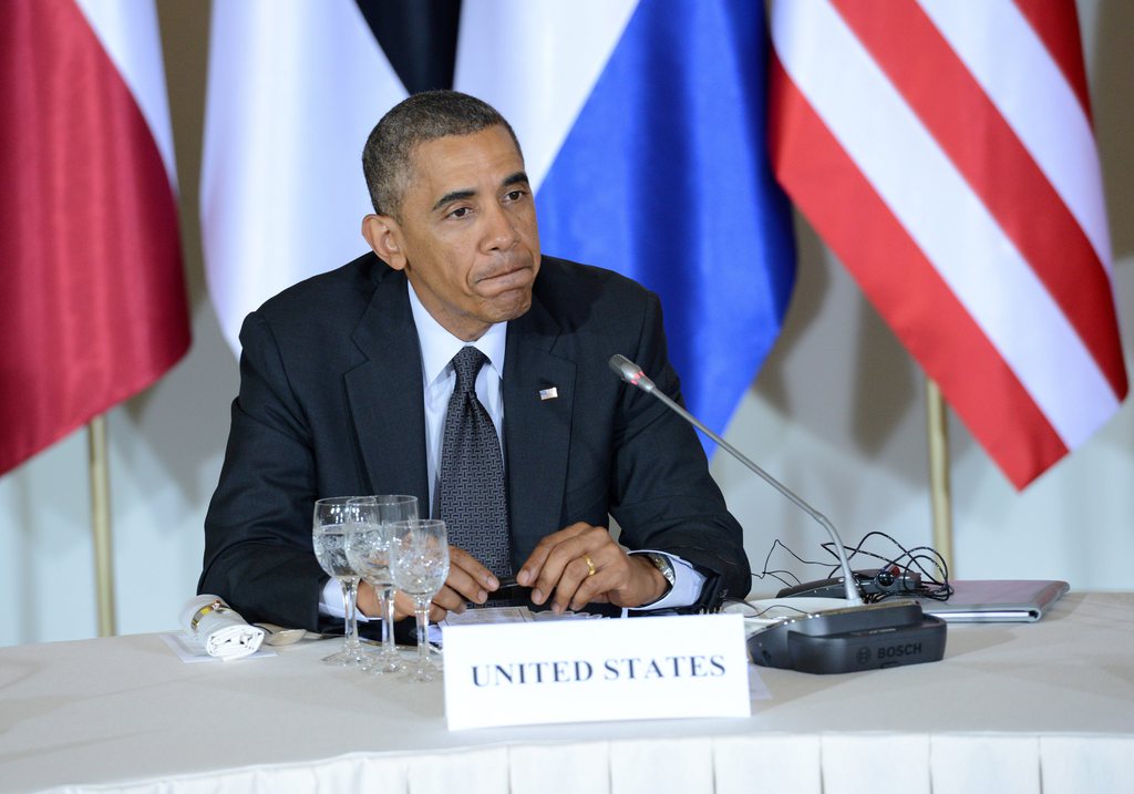 Barack Obama a appelé vendredi Moscou à faire le nécessaire pour amener les séparatistes pro-russes de l'Est ukrainien à déposer les armes.