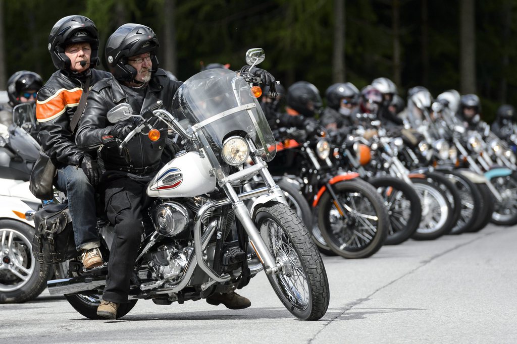 Bikers rides motorbikes during the run of the first edition of the Villars Easy Riders, a newly created Harley Davidson meeting, in the alpine resort of Villars, Switzerland, Sunday, June 30, 2013. (KEYSTONE/Laurent Gillieron)