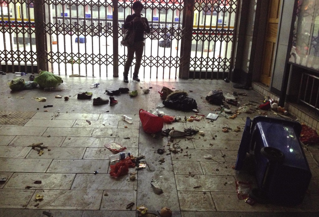 In this March 1, 2014 photo provided by China's Xinhua News Agency, scattered luggage are seen inside the Kunming Railway Station in Kunming, capital of southwest China's Yunnan Province.  More than 10 assailants slashed scores of people with knives at the train station in southern China in what officials said Sunday was a terrorist assault by ethnic separatists from the far west. Twenty-nine slash victims and four attackers were killed and 143 people wounded. (AP Photo/Xinhua, Lin Yiguang) NO SALES