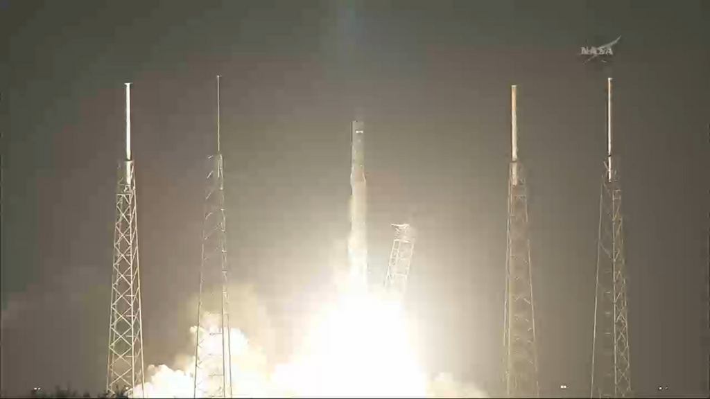 In this framegrab provided by NASA, the SpaceX cargo ship lifts off,  rocketing toward the International Space Station Sunday Sept. 21, 2014. The company launched its unmanned Dragon capsule from Cape Canaveral, Florida, early Sunday aboard a Falcon rocket. It's carrying more than 5,000 pounds of station supplies for NASA, including a 3-D printer, the first one bound for orbit. (AP Photo/NASA TV)