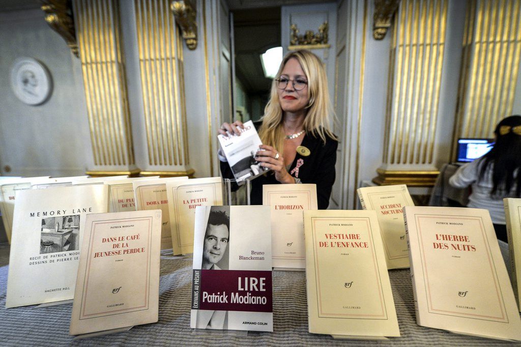 epa04438214 Books by French writer Patrick Modiano are displayed at the Royal Swedish Academy after he was declared the winner of the 2014 Nobel Prize in Literature in Stockholm, Sweden, 09 October 2014. The prize was awarded 'for the art of memory with which he has evoked the most ungraspable human destinies and uncovered the life-world of the occupation,' the Swedish Academy said.  EPA/ANDERS WIKLUND SWEDEN OUT