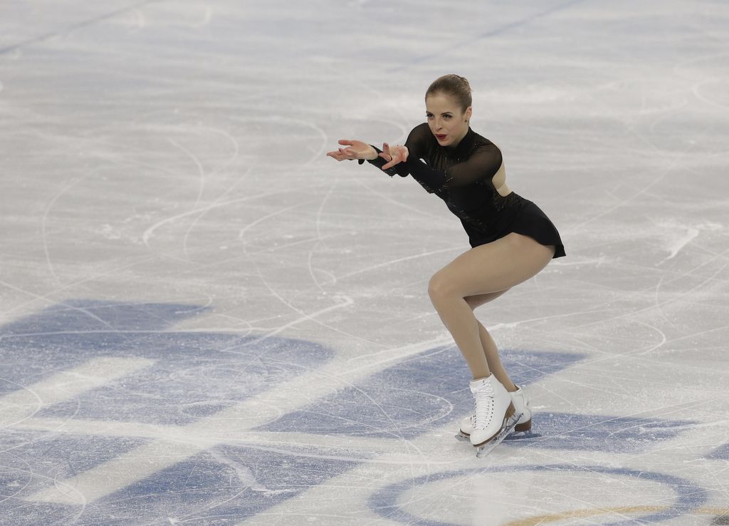 Carolina Kostner of Italy competes in the women's free skate figure skating finals at the Iceberg Skating Palace during the 2014 Winter Olympics, Friday, Feb. 21, 2014, in Sochi, Russia. (AP Photo/Darron Cummings)