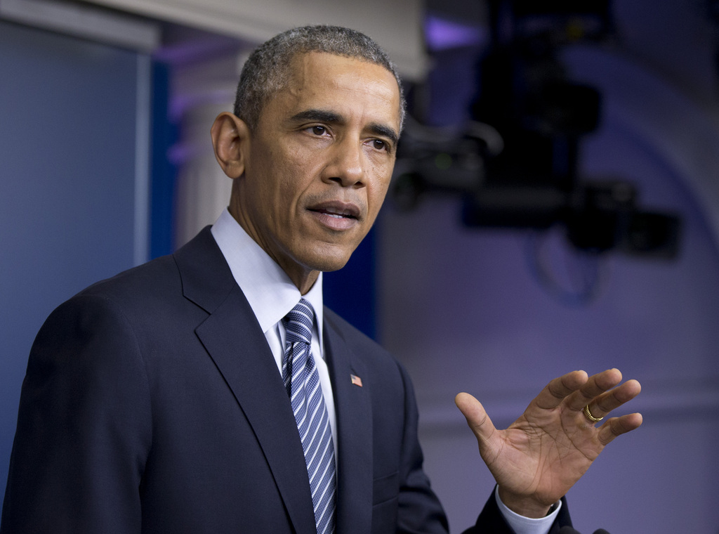 Barack Obama a invité mardi les Américains à engager un débat "constructif" sur les tensions raciales et le maintien de l'ordre aux Etats-Unis en réponse au drame de Ferguson.