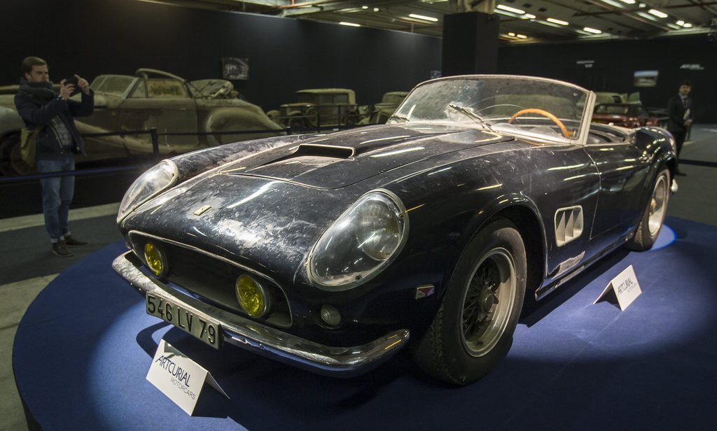 epa04606215 (FILE) A file picture dated 03 February 2015 shows a 1961 Ferrari 250 GT SWB California Spider displayed as part of the Artcurial section of the Retromobile classic automobile show at the Parc des Expositions exhibition hall in Paris, France. The 1961 Ferrari 250 GT SWB California Spider from the Baillon collection has been sold 14.2 millions euros during the Artcurial auction sale on 06 February 2015, running parallel to the Retromobile car show.  EPA/IAN LANGSDON