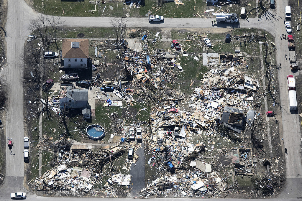 This aerial photo shows destruction in a section of the small town of Fairdale, Ill., in DeKalb County on Friday, April 10, 2015, after a tornado swept through the area the night before. The National Weather Service says at least two tornadoes churned through six north-central Illinois counties. Illinois Gov. Bruce Rauner on Friday declared DeKalb and Ogle counties affected by the severe storms and tornadoes as disaster areas.  (AP Photo/Daily Chronicle, Danielle Guerra)  CHICAGO TRIBUNE OUT, MANDATORY CREDIT