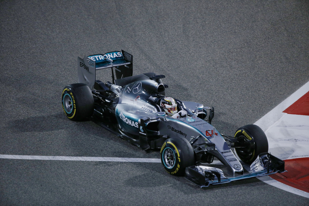 Mercedes driver Lewis Hamilton of Britain leads during the Bahrain Formula One Grand Prix at the Formula One Bahrain International Circuit in Sakhir, Bahrain, Sunday, April 19, 2015. (AP Photo/Hassan Ammar)