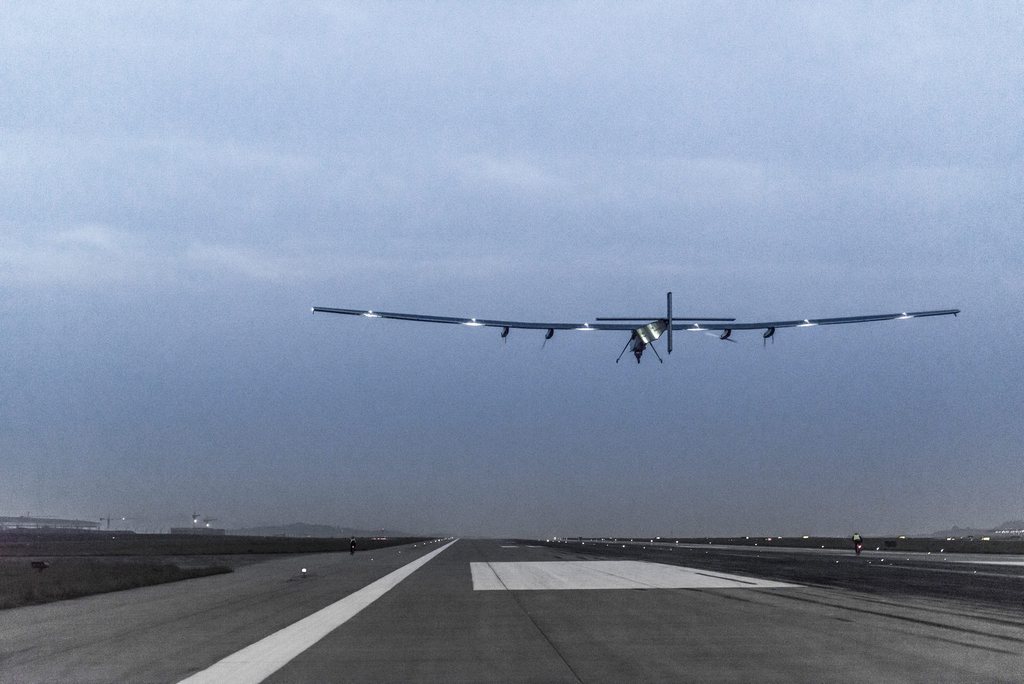 epa04713948 A handout picture made available by Solar Impulse shows Solar Impulse 2 taking-off from Chongqing as it heads to Nanjing with Bertrand Piccard at the controls, in Chongqing, China, 21 April 2015. The First Round-the-World Solar Flight will take 500 flight hours and cover 35,000 km, over five months. Swiss founders and pilots, Bertrand Piccard and Andre Borschberg hope to demonstrate how pioneering spirit, innovation and clean technologies can change the world. The duo will take turns flying Solar Impulse 2, changing at each stop and will fly over the Arabian Sea, to India, to Myanmar, to China, across the Pacific Ocean, to the United States, over the Atlantic Ocean to Southern Europe or Northern Africa before finishing the journey by returning to the initial departure point. Landings will be made every few days to switch pilots and organize public events for governments, schools and universities.  EPA/SOLAR IMPULSE  HANDOUT EDITORIAL USE ONLY/NO SALES