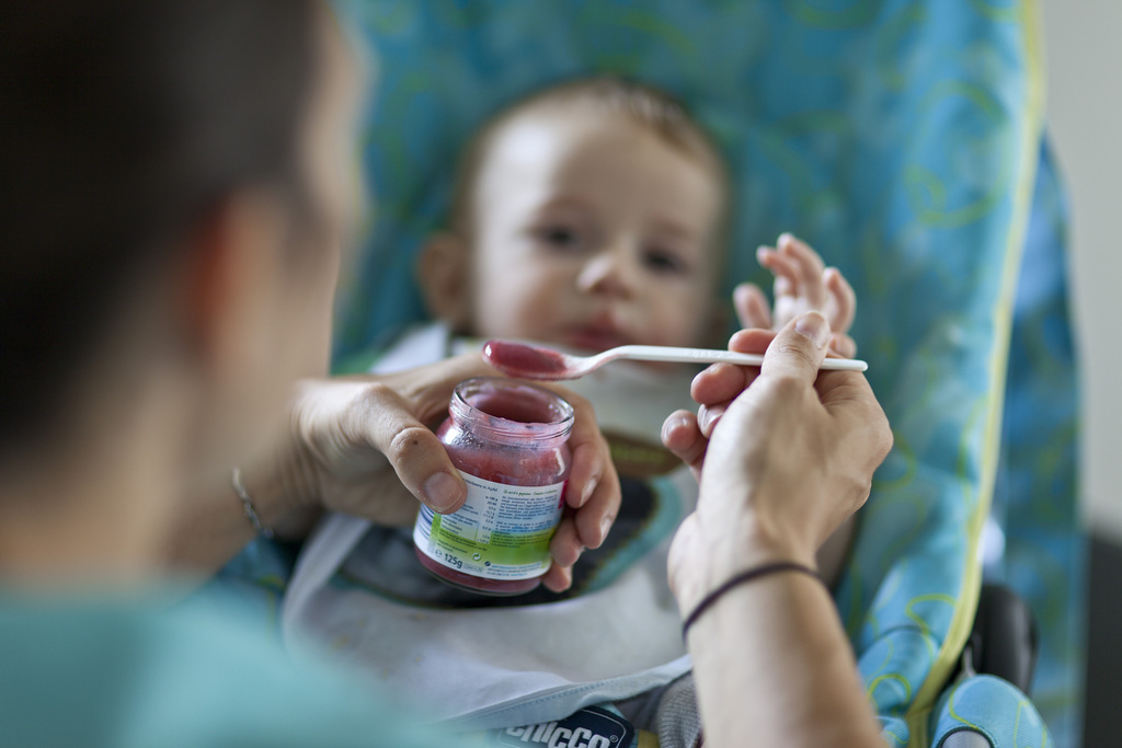 A mother feeds her six-month-old baby Moris, pictured on September 16, 2011, in Unterfelden in the canton of Aargau, Switzerland. (KEYSTONE/Gaetan Bally)