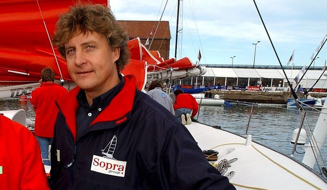 Philippe Monnet, left, of France and Laurent Bourgnon, right, of Switzerland, pose on board of their multihull ''Sopra Group'' in the port of Le Havre, western France, Friday, October 31, 2003, prior to the start of the 6th edition of the Transat Jacques Vabre sailing event. 38 crews will compete in this prestigious double handed race in two classes from Le Havre in the Normandy to Salvador de Bahia in Brazil. (KEYSTONE/Laurent Gillieron)