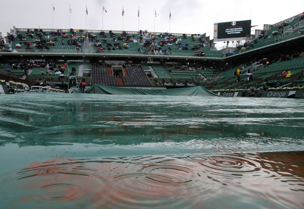 La pluie avait déjà interrompu le Grand Chelem français en 2013.