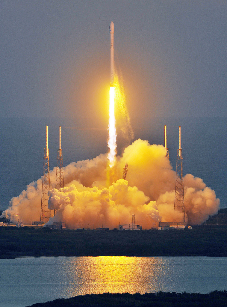 An unmanned Falcon 9 SpaceX rocket lifts off from launch complex 40 at the Cape Canaveral Air Force Station, Wednesday, Feb. 11, 2015, in Cape Canaveral, Fla. On board is the Deep Space Climate Observatory, which will head toward a solar-storm lookout point a million miles away. (AP Photo/Florida Today, Craig Rubadoux)  NO SALES