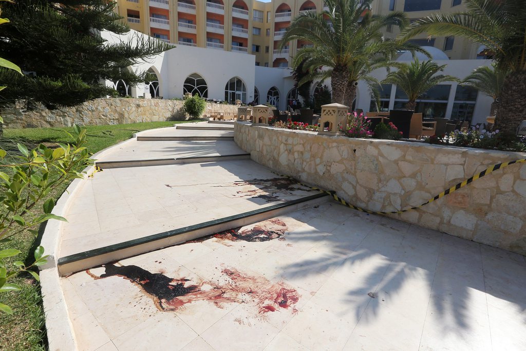 epa04820205 Blood stains the steps leading to Imperial Marhaba Hotel in the resort town of al-Sousse, a popular tourist destination 140 km south of Tunis,Tunisia, June 26 June 2015. According to local reports unknown assailants detonated at least one bomb then opened fire on tourists at two hotels, killing at least 28, including Germans, Brits and Belgians and wounding several others, some while they were sunbathing, at least one of the attackers was killed by Tunisian security services, while a second has been arrested.  EPA/MOHAMED MESSARA