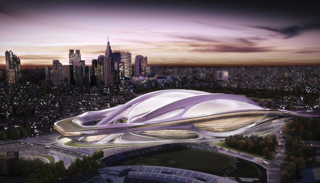 FILE - This file artist rendering released by Japan Sport Council shows a new stadium, designed by award-winning British-Iraqi architect Zaha Hadid, Tokyo plans to build for the 2020 Summer Olympic Games. Japanese Olympic officials say they will adhere to plans laid out in their successful bid to host the 2020 Games despite criticism that costs are too high. Speaking after a two-day orientation seminar with the International Olympic Committee in Tokyo Friday, Nov. 15, 2013, Japanese Olympic Committee president Tsunekazu Takeda said plans to build the 80,000-seat stadium are still in place. (AP Photo/Japan Sport  Council, File)