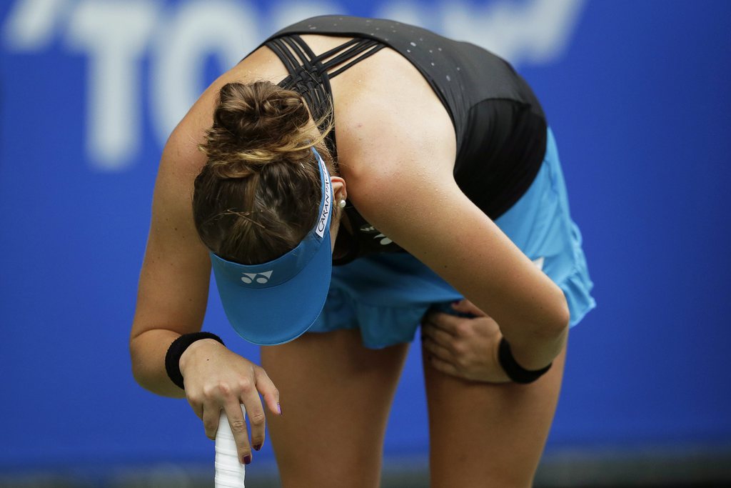 Visiblement atteinte, Belinda Bencic a abandonné.