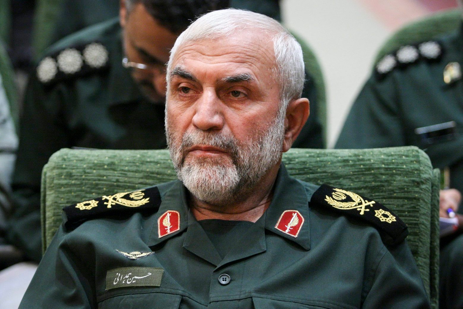 In this Dec. 9, 2009 photo, released by Iranian Tasnim News Agency, Iranian Revolutionary Guard Gen. Hossein Hamedani sits in a meeting in Tehran, Iran. Hamedani, a senior commander in Iran's powerful Revolutionary Guard was killed by Islamic State extremists on the outskirts of the northern Syrian city of Aleppo, Iranian state media reported on Friday. A state television report said that Gen. Hossein Hamedani was killed in the suburbs of Aleppo while "carrying out an advisory mission."  (AP Photo/Tasnim News Agency, Hamed Malekpour) Mideast Iran Syria