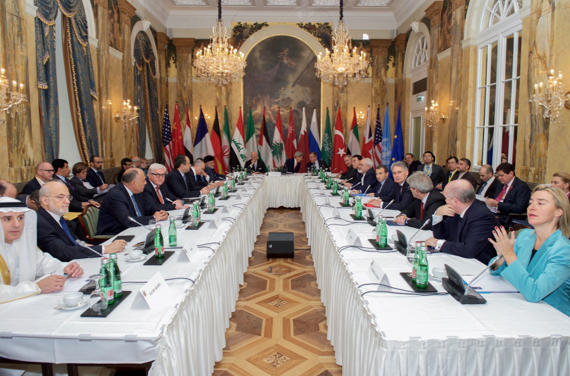 epa05003636 A handout photograph made avaiable by the US Department of State showing US Secretary of State John Kerry (C-R) sitting with his fellow Foreign Ministers at the Hotel Imperial in Vienna, Austria, 30 October 2015, prior to a group discussion about ways to stop the fighting in Syria. UN Syria envoy Staffan de Mistura said on 30 October 2015 that the peace negotiations in Vienna could offer a 'light at the end of the tunnel' in the war. Among the countries attending are Saudi Arabia, Turkey, Jordan, Egypt, the United Arab Emirates, Qatar, Iraq and Lebanon Germany, USA, Russia, Britain, France, Italy.  EPA/US DEPARTMENT OF STATE / HANDDOUT  HANDOUT EDITORIAL USE ONLY/NO SALES