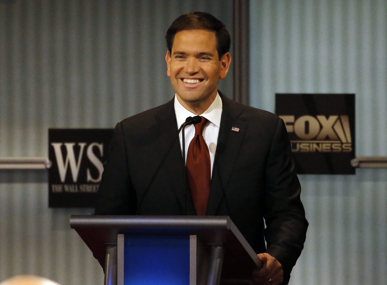 Marco Rubio smiles as he speaks during Republican presidential debate at Milwaukee Theatre, Tuesday, Nov. 10, 2015, in Milwaukee. (AP Photo/Morry Gash)