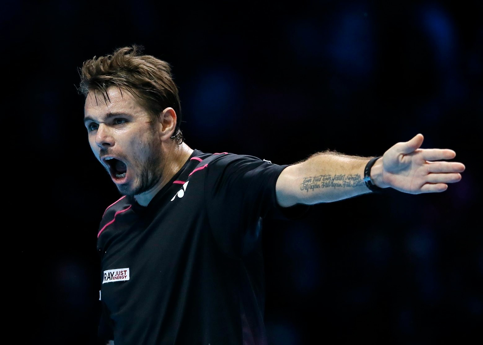 Stan Wawrinka of Switzerland shouts after he plays a return to David Ferrer of Spain during their singles tennis match at the ATP World Tour Finals at the O2 Arena in London, Wednesday, Nov. 18, 2015. (AP Photo/Kirsty Wigglesworth) Britain Tennis ATP Finals