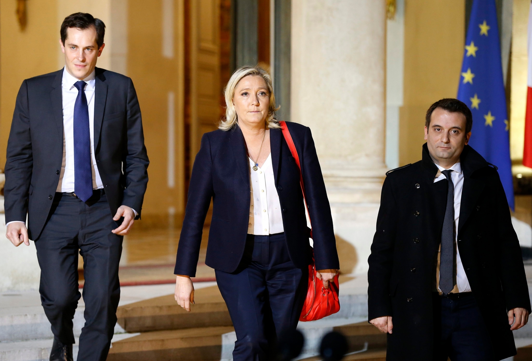 epa05027056 Leader of the French far-right party Front National (FN) Marine Le Pen (C), vice president Florian Philippot (R) and General Secretary Nicolas Bay (L), leave after a meeting with French President Francois Hollande (not pictured) at the Elysee Palace in Paris, France, 15 November 2015. At least 129 people were killed in a series of attacks in Paris on 13 November, according to French officials. Eight assailants were killed, seven when they detonated their explosive belts, and one when he was shot by officers, police said. French President Francois Hollande says that the attacks in Paris were an 'act of war' carried out by the Islamic State extremist group.  EPA/GUILLAUME HORCAJUELO FRANKREICH TERRORISMUS ANSCHLAEGE PARIS