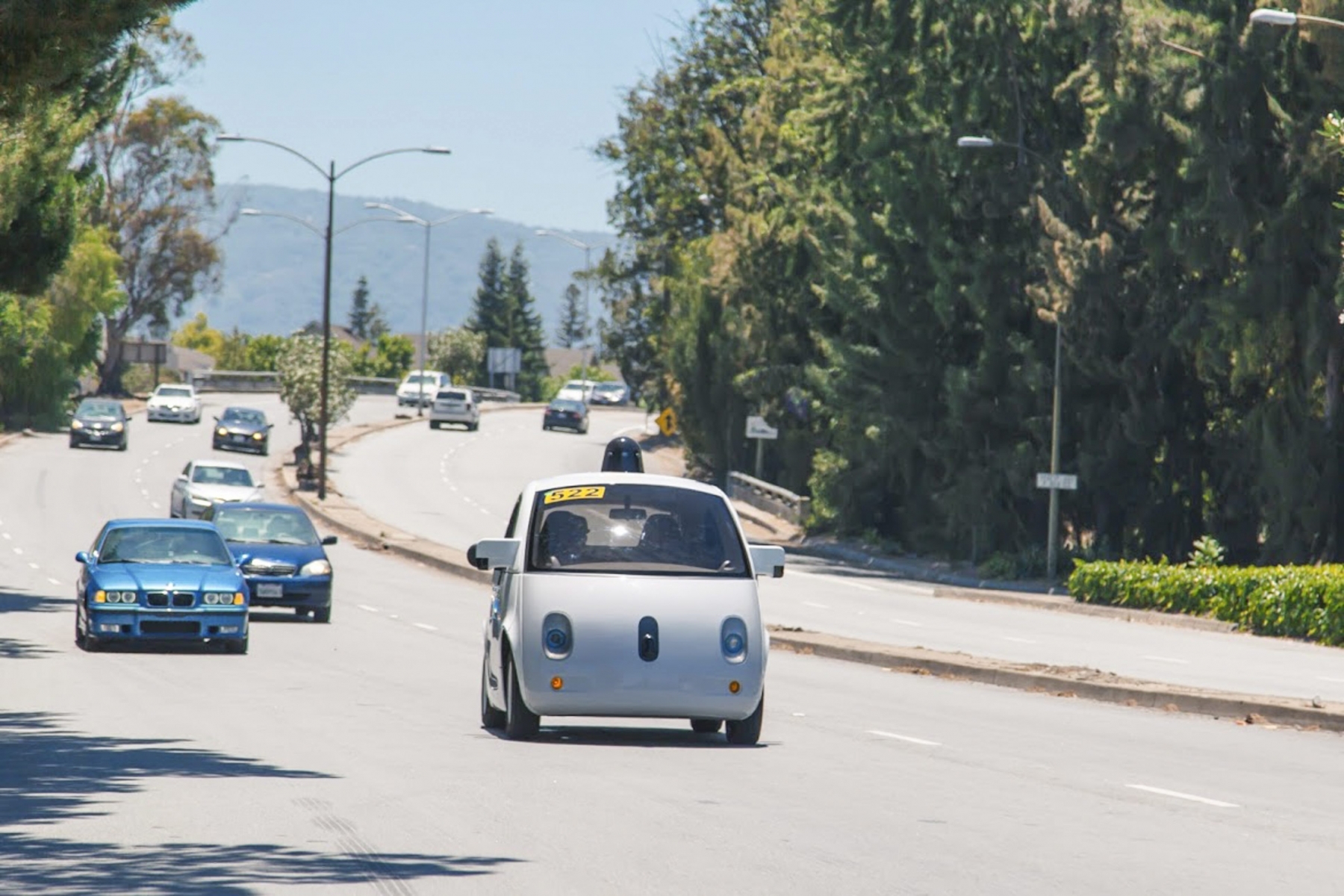 epa04821380 A handout photo made available by Google on 26 June 2015 shows the Google self-driving car on the streets of Mountain View, California, USA. According to Google, the top speed of the test vehicle is 25 miles per hour (40 KmH) and they are equipped with steering wheel, accelerator and brake pedal.  EPA/GOOGLE / HANDOUT  HANDOUT EDITORIAL USE ONLY/NO SALES