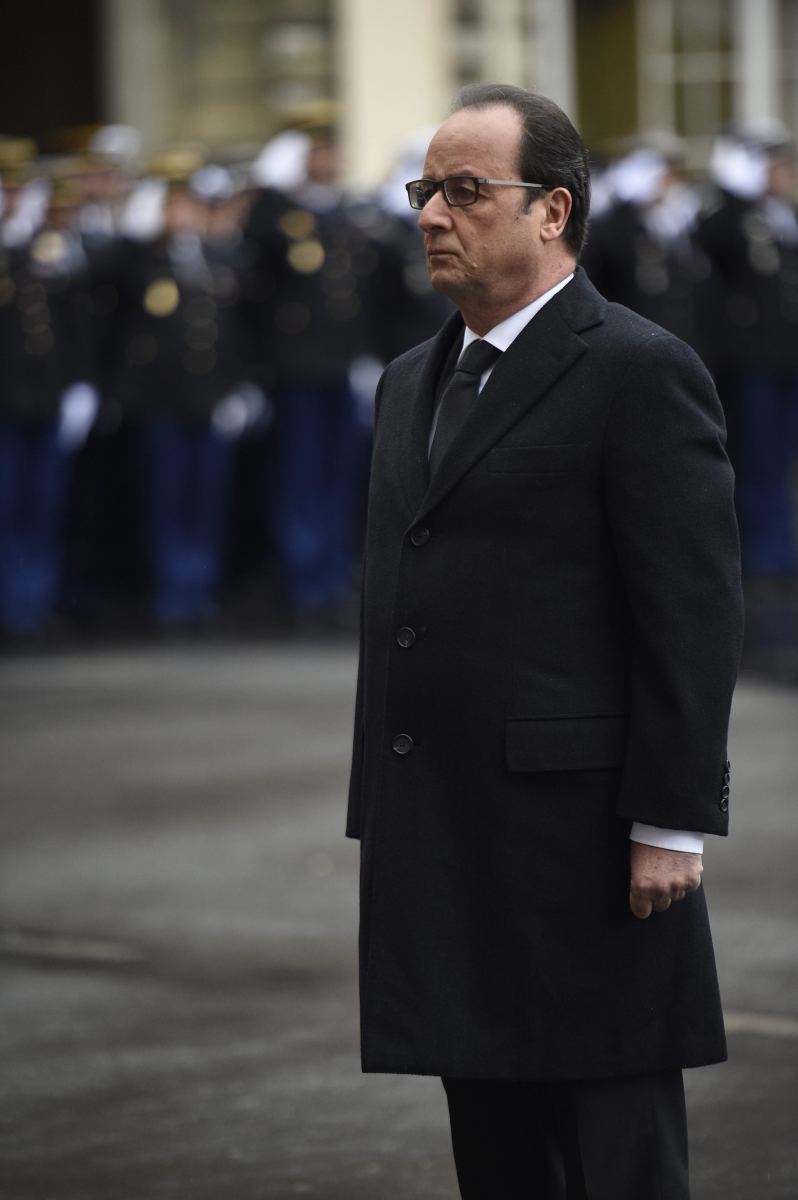 epa05091274 French President Francois Hollande pays tribute to the victims of the Paris terror attacks during a visit to the French anti-terror security forces (Sentinelle) at Paris's police headquarters, in Paris, France, 07 January 2016, exactly one year after the attack targeting the French satirical newspaper Charlie Hebdo. The 07 January 2015 shootings at the Charlie Hebdo offices, which left 12 dead, were followed by an unprecedented series of killings in subsequent months that culminated in Islamic State attacks on Paris that left 130 dead. Hollande detailed plans toughening laws against organised crime and terrorism in his remarks to police.The reforms aim to introduce measures including more flexible rules of engagement for armed police and stronger stop-and-search powers.  EPA/MARTIN BUREAU / POOL MAXPPP OUT