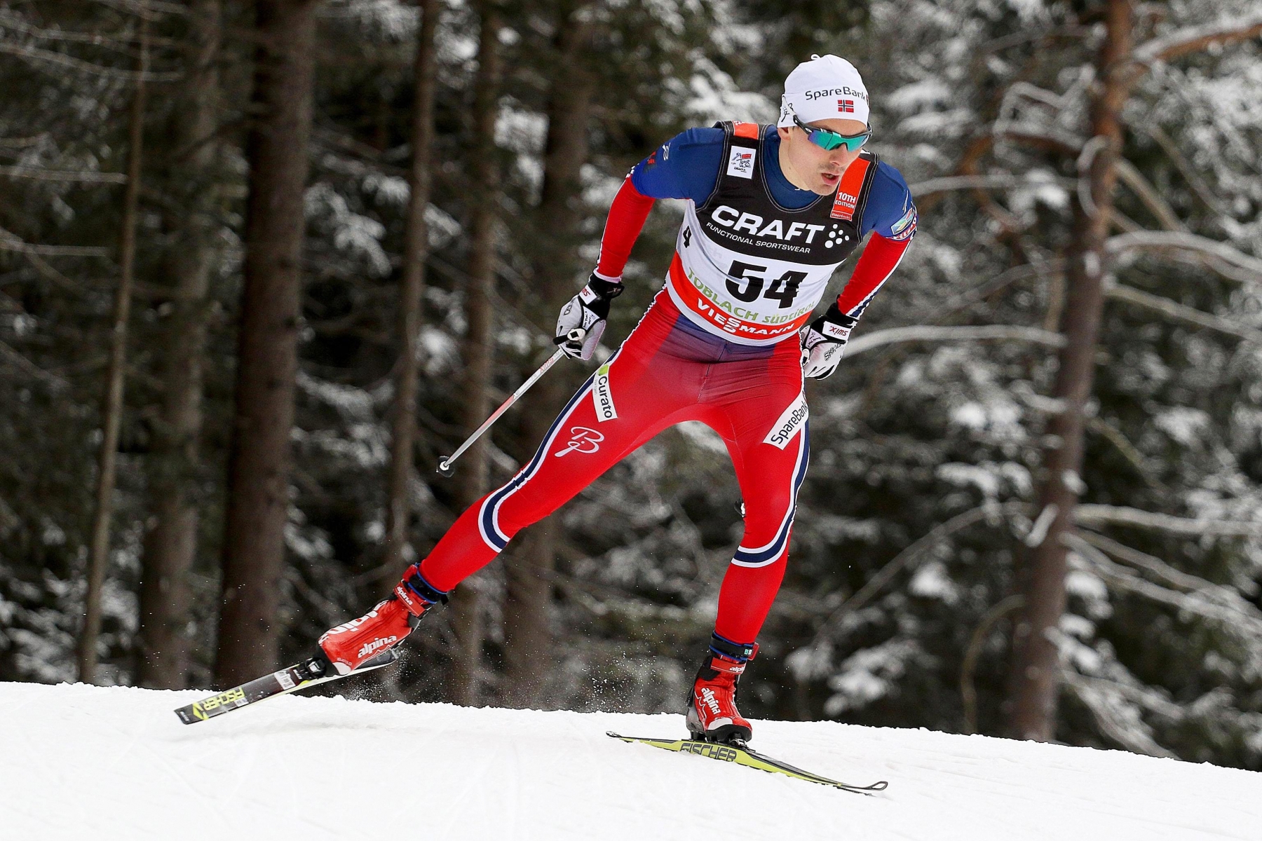 epa05092506 Finn Haagen Krogh of Norway is on his way to win the men's 10km race at the FIS Tour de Ski as part of the Cross Country Skiing World Cup in Toblach (Dobbiaco), Italy, 08 January 2016.  EPA/ANDREA SOLERO ITALY CROSS COUNTRY SKIING WORLD CUP