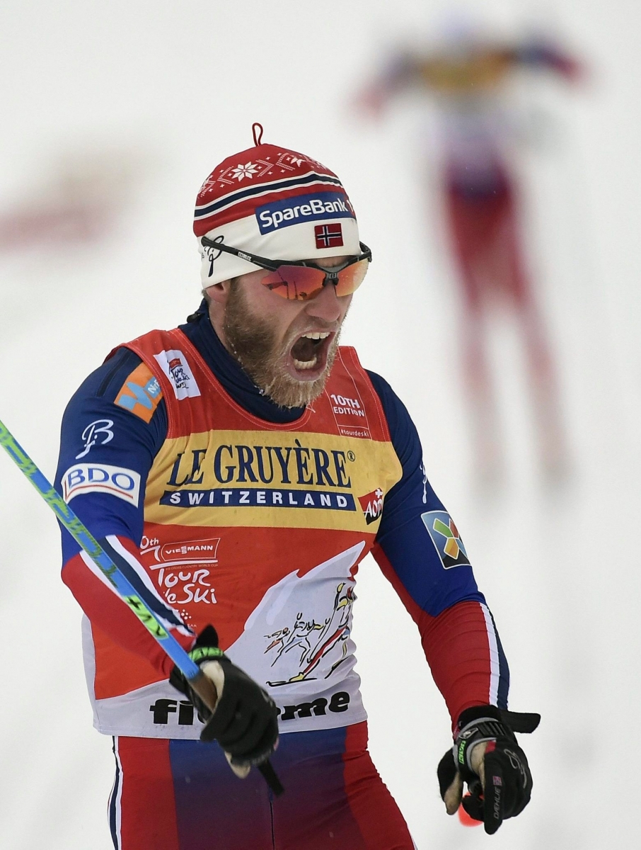 Martin Johnsrud Sundby, of Norway, celebrates in the finish area after winning a men's Classic Mass Start 15-k race at the Tour de Ski, part of the Cross-Country Ski World Cup in Val di Fiemme, Italy, Saturday, Jan. 9, 2016. (Claudio Onorati/ANSA via AP) Italy Cross-Country Ski World Cup