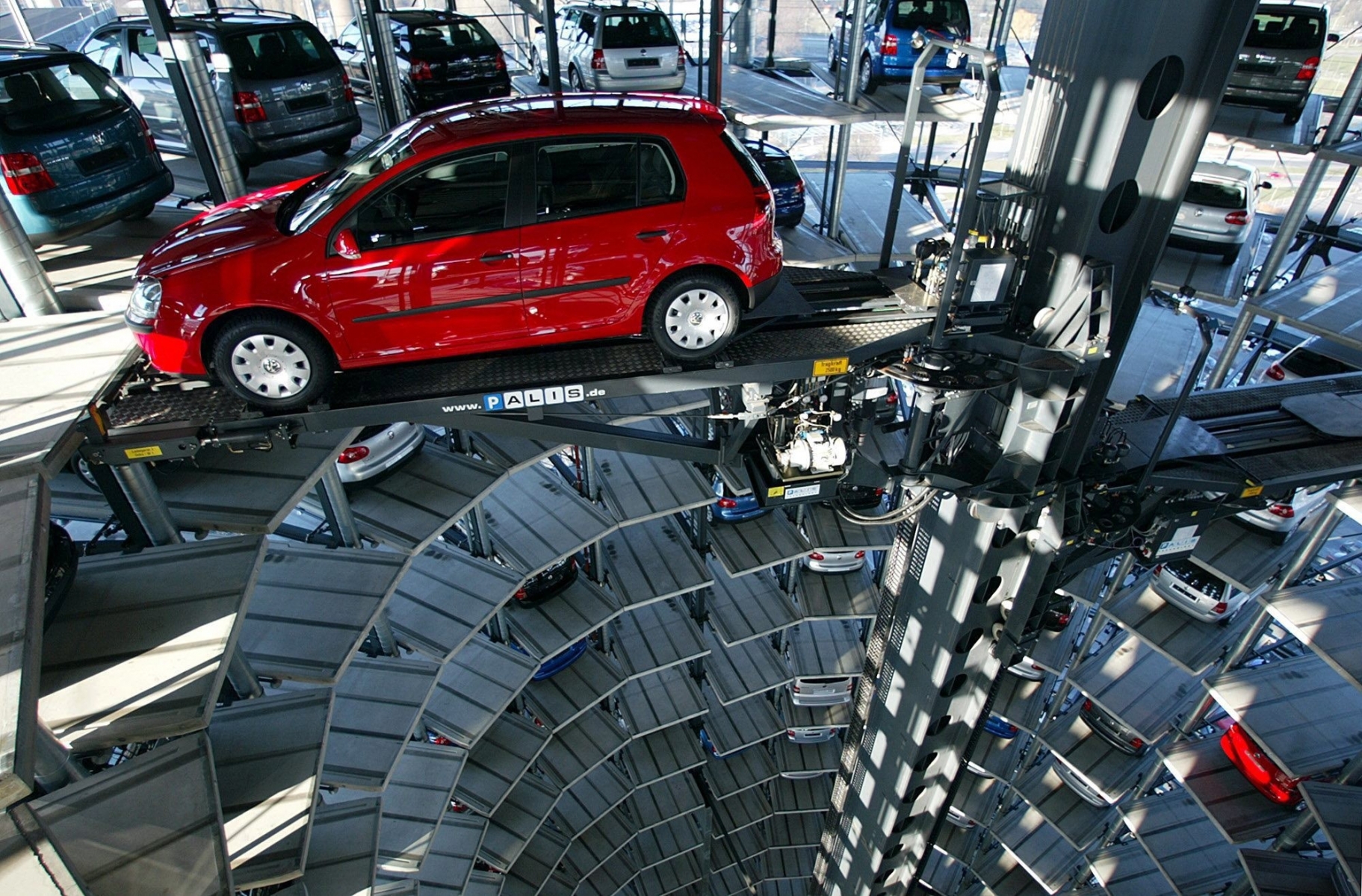 A VW Golf V car ( fifth generation Golf) is loaded in a " Distribution-Tower " at the Volkswagen "Car-Town" in Wolfsburg, northern Germany, in this March 5, 2004 file photo. German 'Bild' newspaper reported Thursday, Oct. 28, 2004 citing company sources, that between 5,000  and 15,000 jobs could be endangered in the Volkswagen plant in Wolfsburg.  (AP Photo/Fabian Bimmer)











  INDUSTRIE AUTOMOBILE