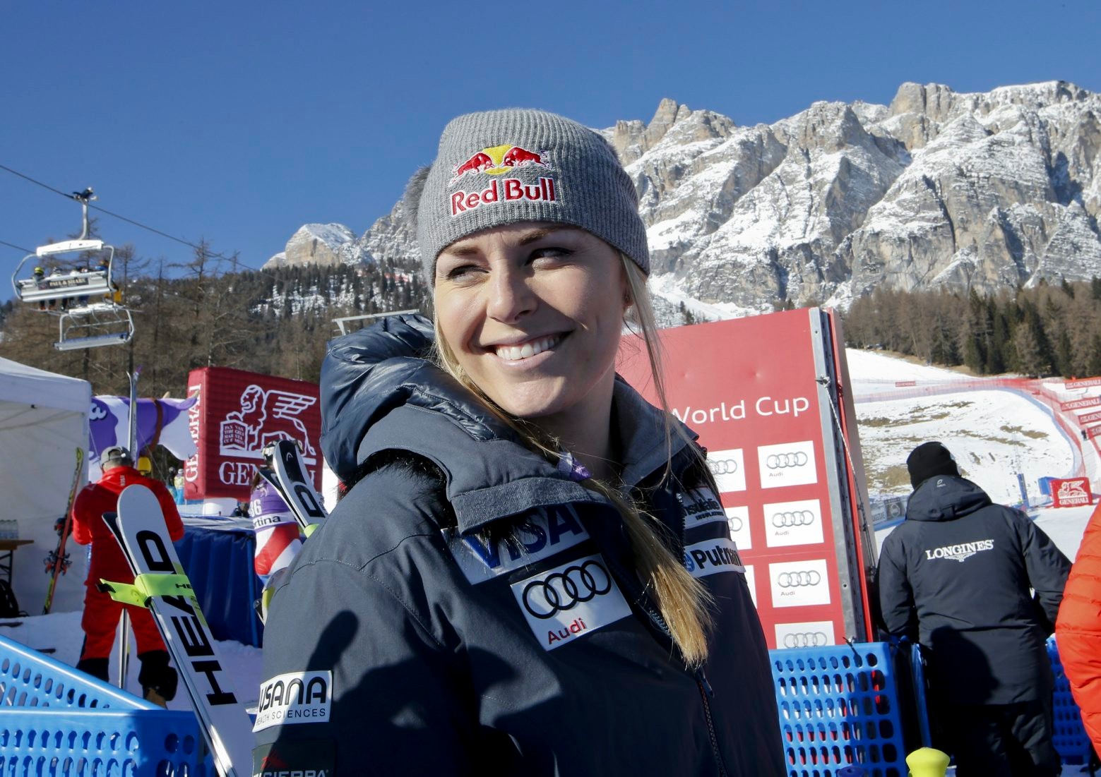 Lindsey Vonn, of the United States, smiles in the finish area after completing a training session for an alpine ski, women's World Cup downhill, in Cortina D'Ampezzo, Italy, Friday, Jan. 22, 2016. (AP Photo/Armando Trovati) Italy Alpine Skiing World Cup
