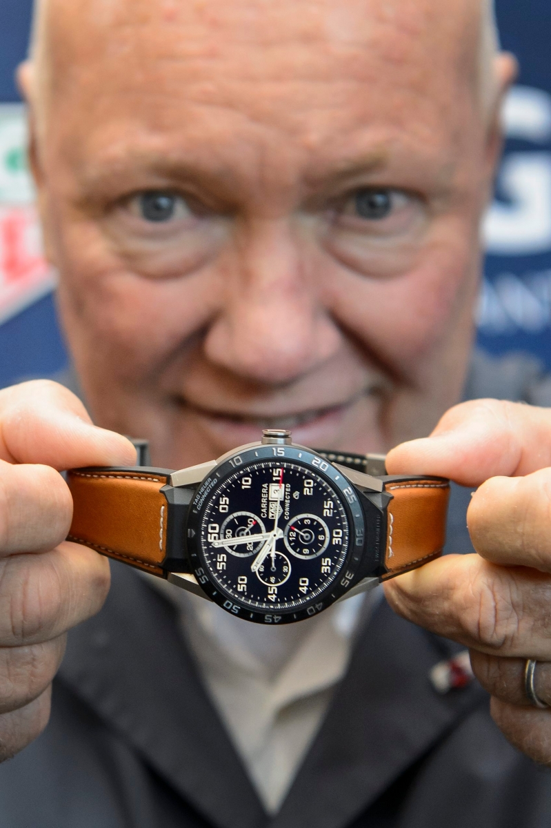 TAG Heuer CEO and President of LVMH Watch Division, Jean-Claude Biver, poses with the new titanium Carrera Connected watch during a press event at the TAG Heuer headquarters, in La Chaux-de-Fonds, Switzerland, Thursday, December 3, 2015. (KEYSTONE/Jean-Christophe Bott) SWITZERLAND TAG HEUER CONNECTED WATCH