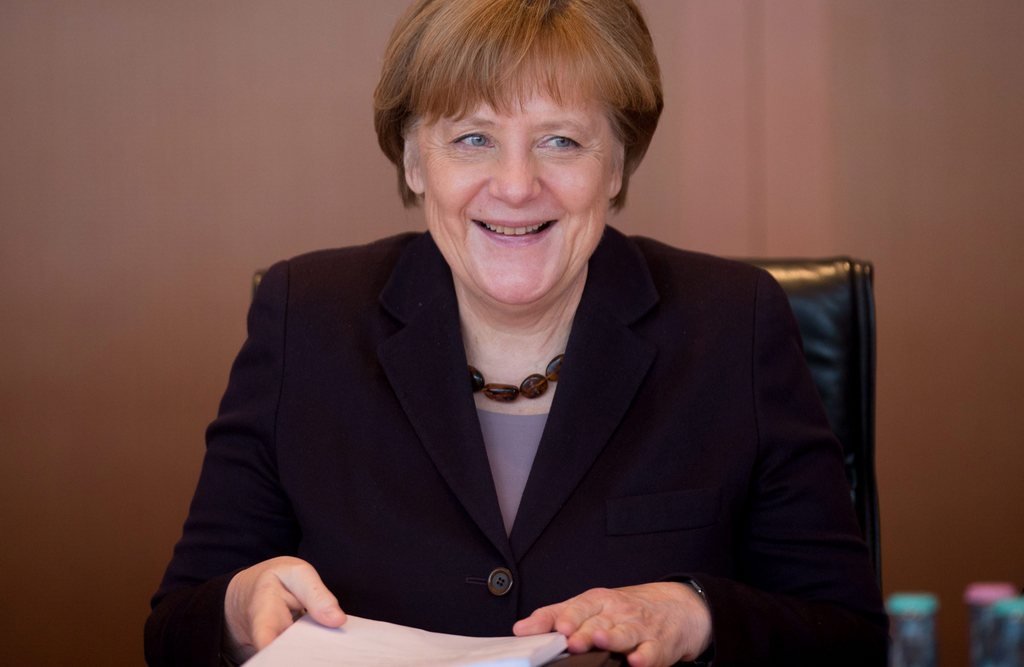 "Mme Merkel a confirmé personnellement qu'elle va participer", a déclaré M. Schneider-Ammann.