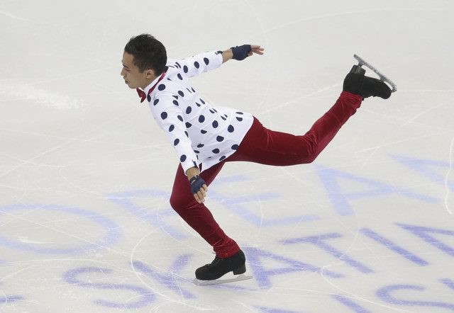 epa05130002 Florent Amodio of France competes in the Men's Short Program during the Figure Skating European Championships in the Ondrej Nepela Arena in Bratislava, Slovakia, 27 January 2016. EPA/JAKUB GAVLAK