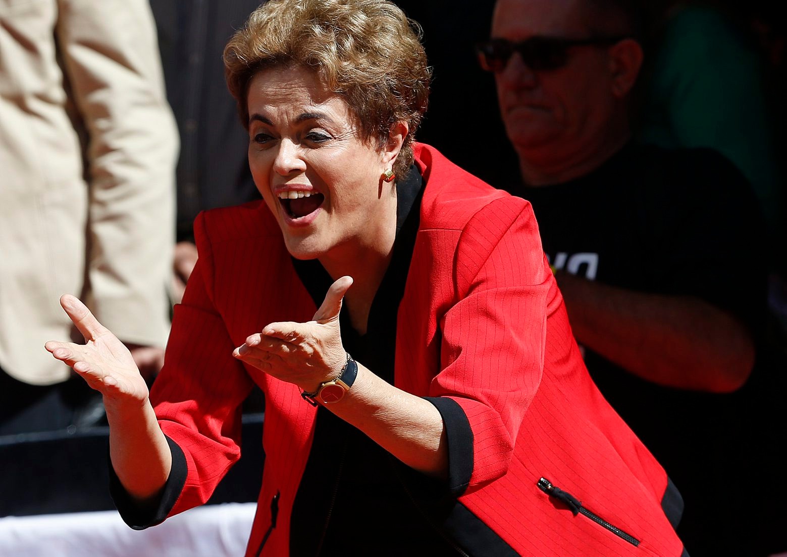 Brazil's President Dilma Rousseff blows kisses towards supporters during the May Day rally in Sao Paulo, Brazil, Sunday, May 1, 2016. President Rousseff is facing impeachment over allegations her administration violated fiscal laws. (AP Photo/Andre Penner) Brazil May Day