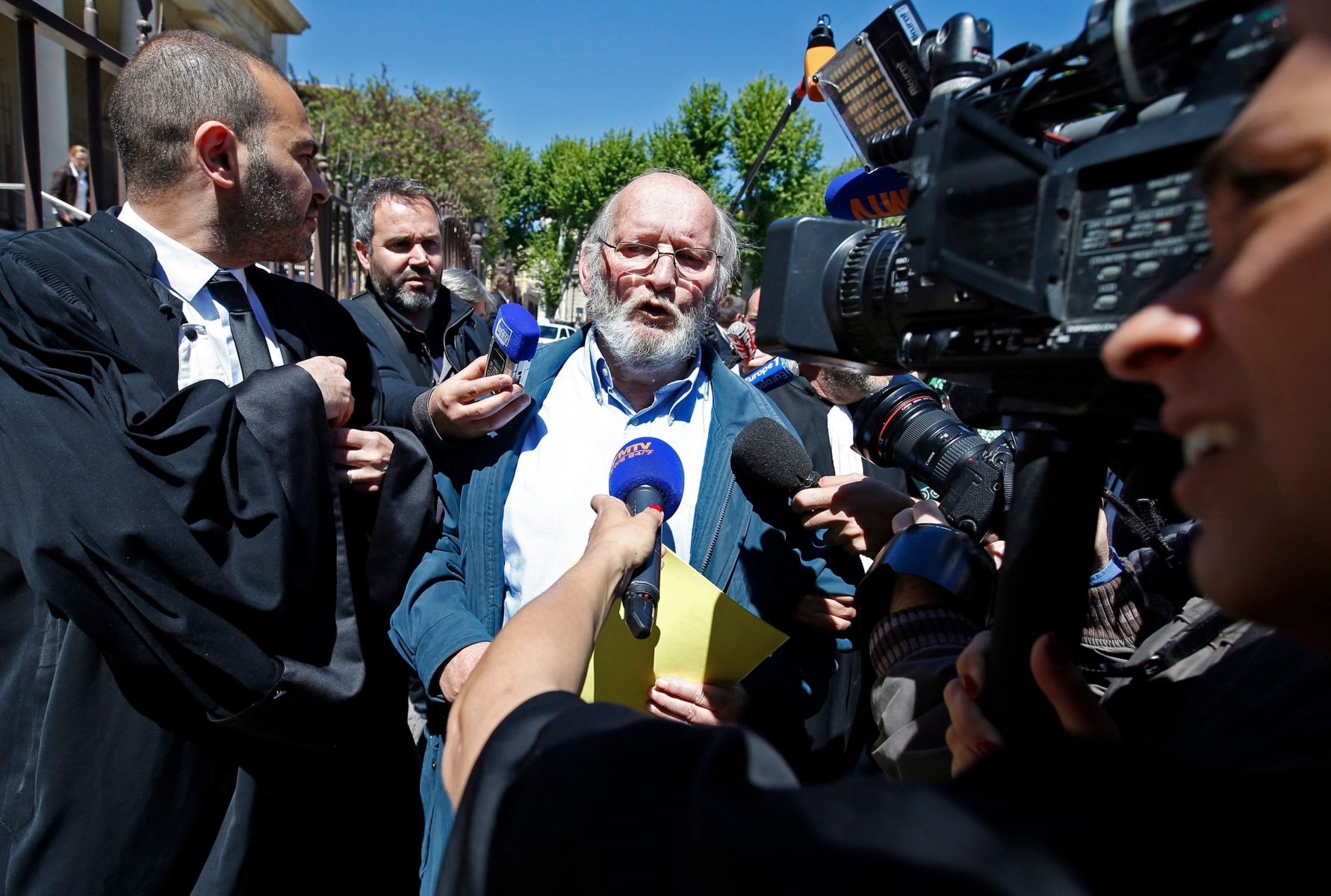 epa05287008 Jean Claude Mas, former head of Poly Implant Prothese (PIP) (C) leaves the appeal court of Aix-en-Provence, France, 02 May 2016. A French appeal court (confirmed) the sentence of Jean-Claude Mas who was found guilty of fraud on the worldwide sale of breast implants, sentenced to four years in prison and fined 75,000 euros in 2013 after a police investigation. Between 300,000 and 400,000 women in 65 countries from Europe to Latin America have implants made with the sub-standard gel.  EPA/GUILLAUME HORCAJUELO FRANCE TRIAL MAS BREAST IMPLANTS