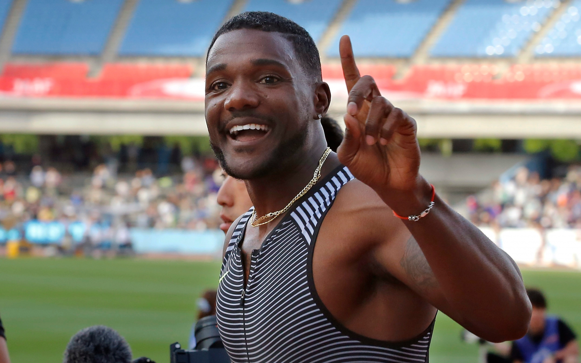 Justin Gatlin of the United States reacts after winning the men's 100 meter of the Golden Grand Prix track and field in Kawasaki, near Tokyo, Sunday, May 8, 2016. (AP Photo/Shizuo Kambayashi) Japan Athletics Golden Grand Prix