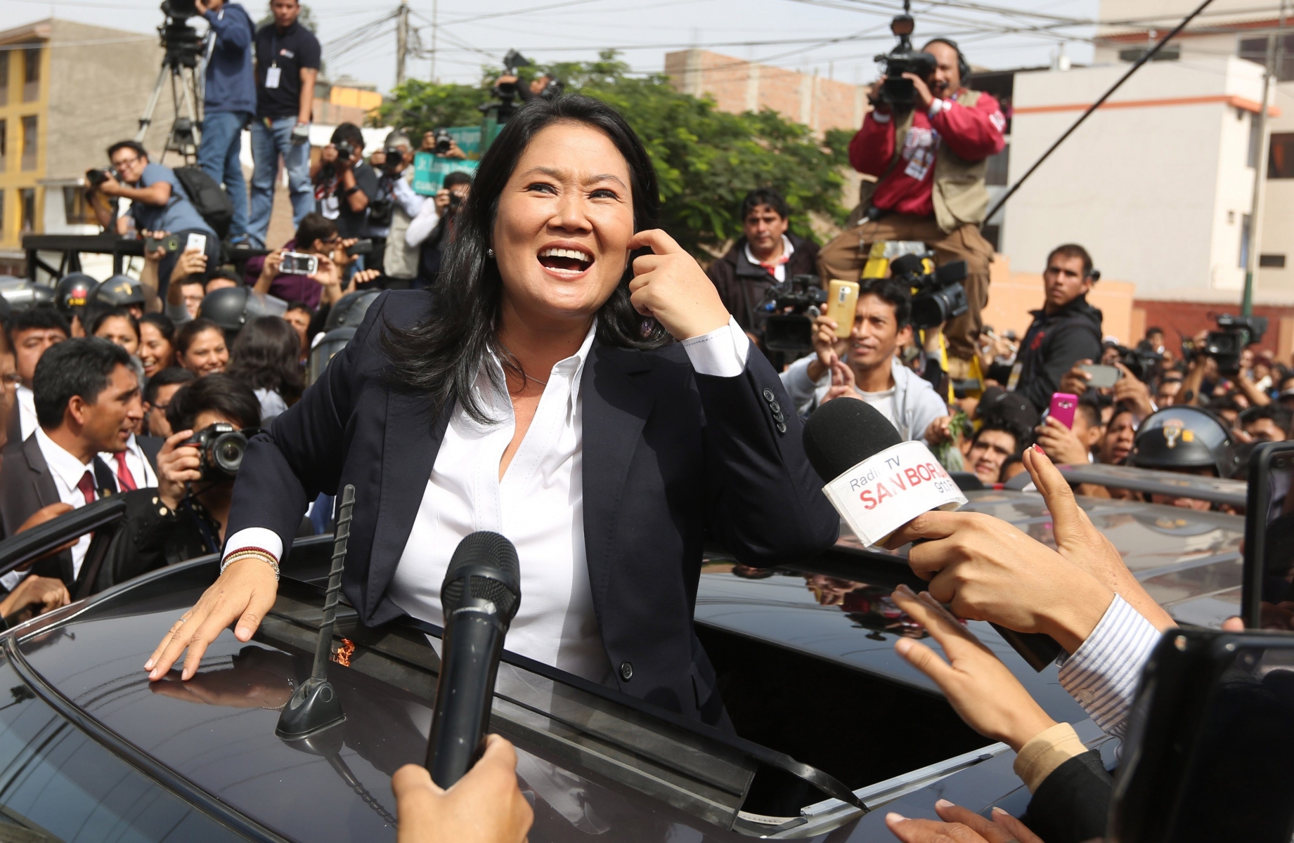 Presidential candidate Keiko Fujimori attends questions from the press,  after casting her ballot in Lima, Peru, Sunday, June 5, 2016. Peru is holding a runoff a presidential election between economist Pedro Pablo Kuczynski and Keiko Fujimori, the daughter of Peru's former strongman. (AP Photo/Martin Mejia) Peru Presidential Election