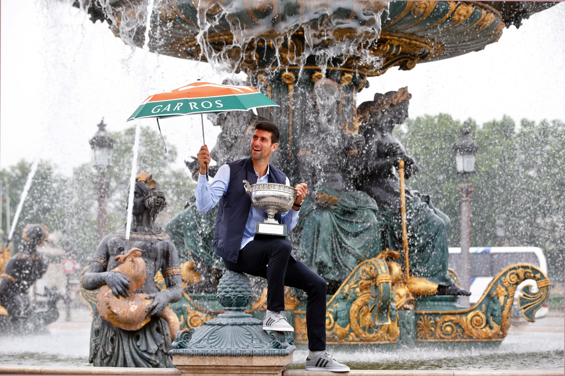 Novak Djokovic, from Serbia, poses with the French Open tennis trophy during a photo session at the Place de la Concorde, in Paris, Monday June 6, 2016. Djokovic was the winner against Britain's Andy Murray in four sets 3-6, 6-1, 6-2, 6-4. (AP Photo/Thibault Camus) APTOPIX France Tennis Open Djokovic
