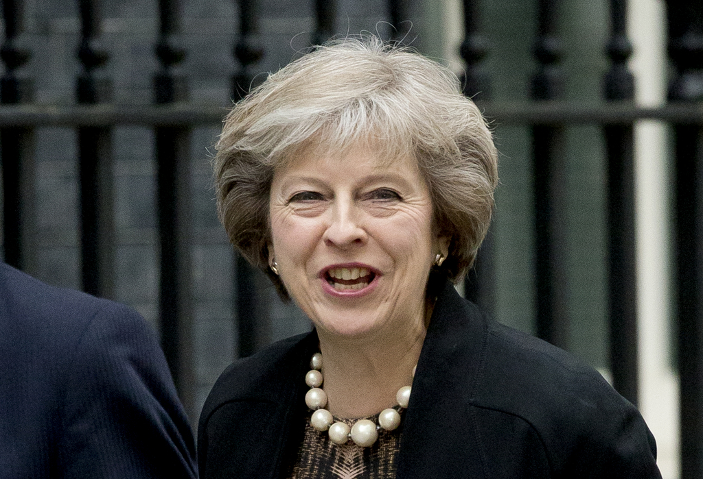 Theresa May, ministre de l'Intérieur et pilier des Tories, est donnée favorite par les bookmakers.