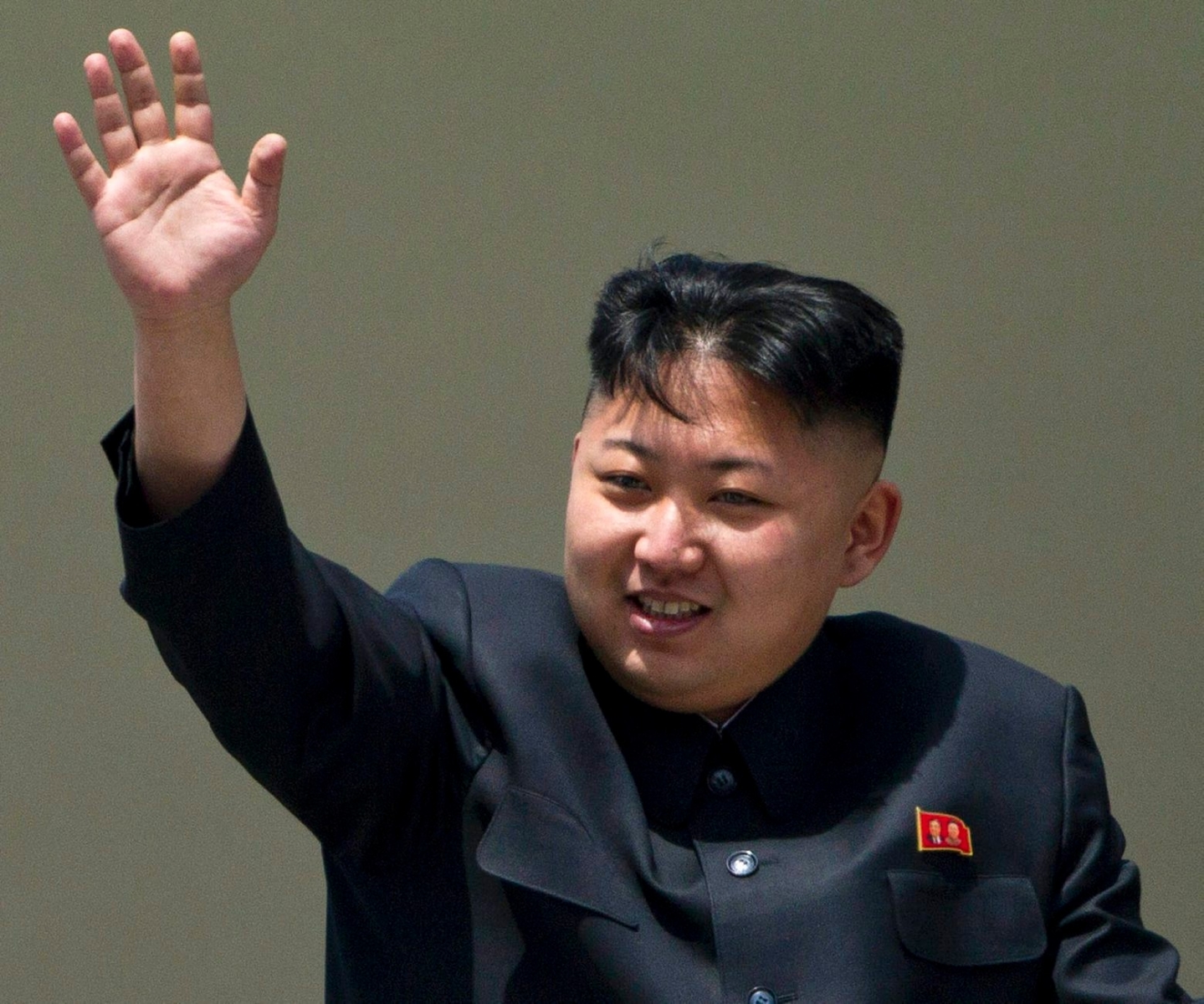 FILE - In this Sunday, April 15, 2012 file photo, North Korean leader Kim Jong Un waves from a balcony at the end of a mass military parade in Pyongyang's Kim Il Sung Square. North Korea fired a long-range rocket Wednesday morning in its second launch under its new leader, defying warnings from the U.N. and Washington only days before South Korean presidential elections. (AP Photo/David Guttenfelder, File) North Korea Rocket Launch