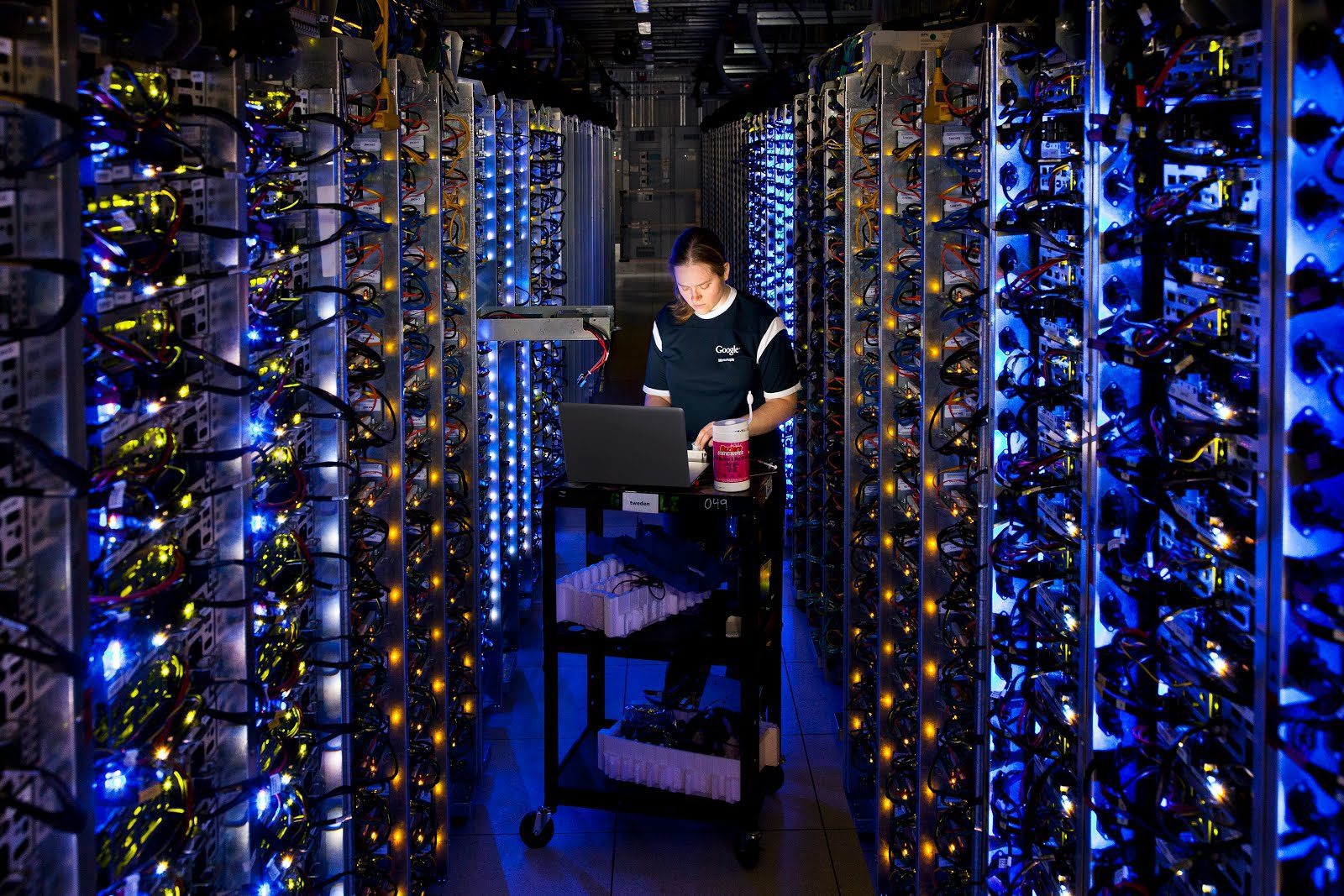 In this undated photo made available by Google, Denise Harwood diagnoses an overheated computer processor at Googleís data center in The Dalles, Ore. Google uses these data centers to store email, photos, video, calendar entries and other information shared by its users. These centers also process the hundreds of millions of searches that Internet users make on Google each day. (AP Photo/Google, Connie Zhou) NSA Phone Records Big Data Photo Gallery