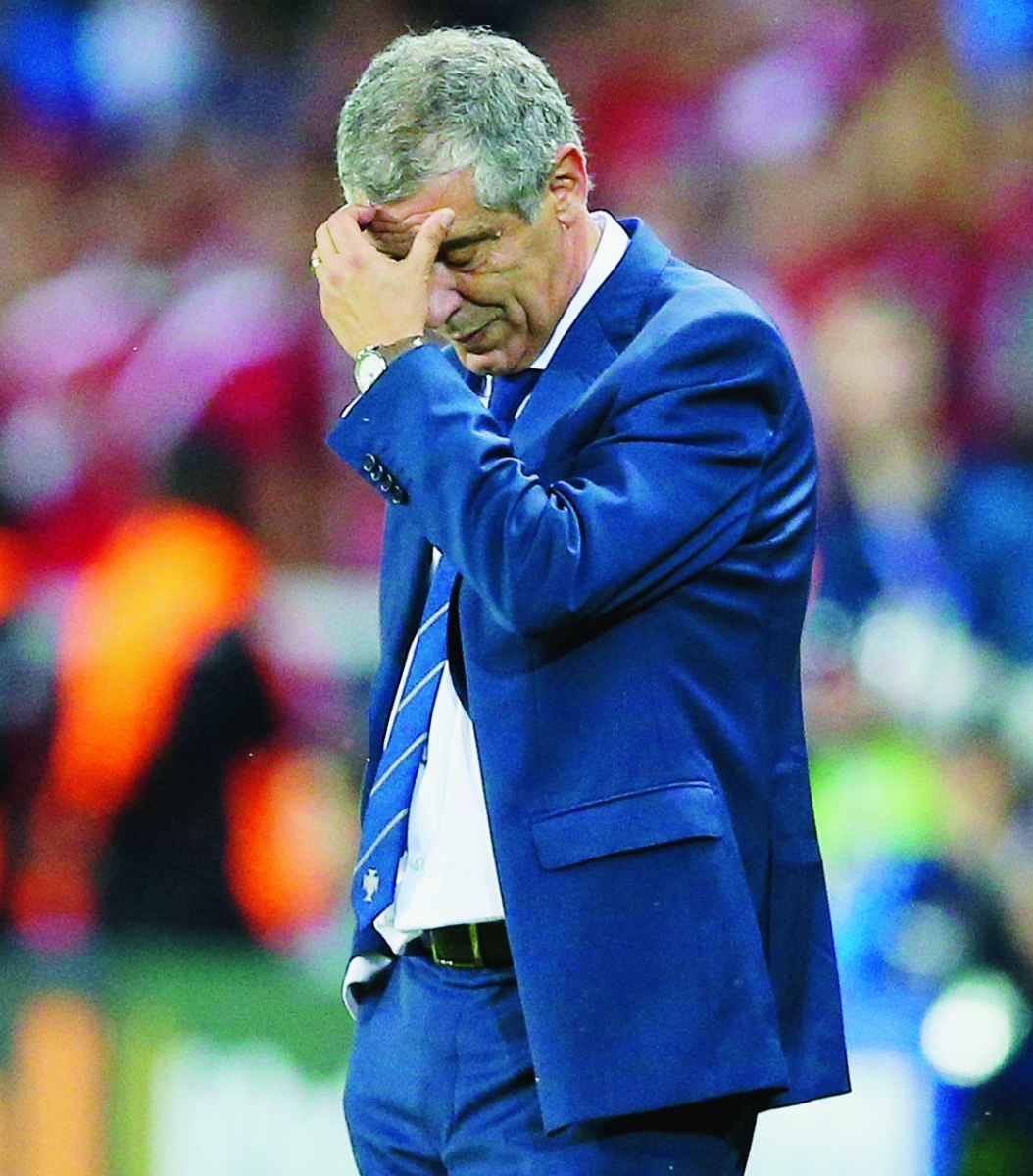 epa05376513 Portugal coach Fernando Santos reacts  during the UEFA EURO 2016 group F preliminary round match between Portugal and Austria at Parc des Princes Stadium in Paris, France, 18 June 2016. The match ended 0-0.



(RESTRICTIONS APPLY: For editorial news reporting purposes only. Not used for commercial or marketing purposes without prior written approval of UEFA. Images must appear as still images and must not emulate match action video footage. Photographs published in online publications (whether via the Internet or otherwise) shall have an interval of at least 20 seconds between the posting.)  EPA/MIGUEL A. LOPES   EDITORIAL USE ONLY FRANCE SOCCER UEFA EURO 2016